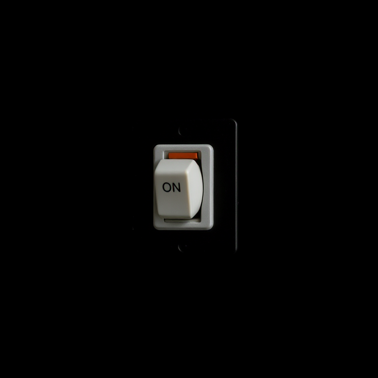 Create a high-resolution image of a toggle switch labeled "ON" against a solid black background, using a Canon EOS R5 with a 50mm f/1.2 lens, aperture set to f/2.8, ISO 100, and a soft diffused lighting setup to enhance contrast and detail.