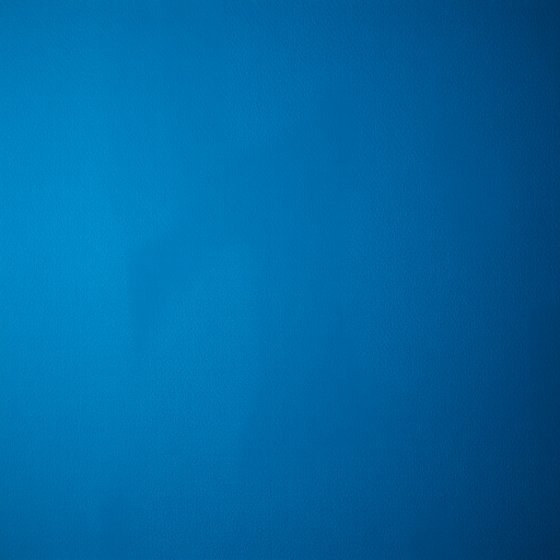 Create a deep blue textured background with high contrast, using a DSLR camera with a 50mm lens, aperture f/2.8, ISO 100, and soft lighting to enhance the details and depth.