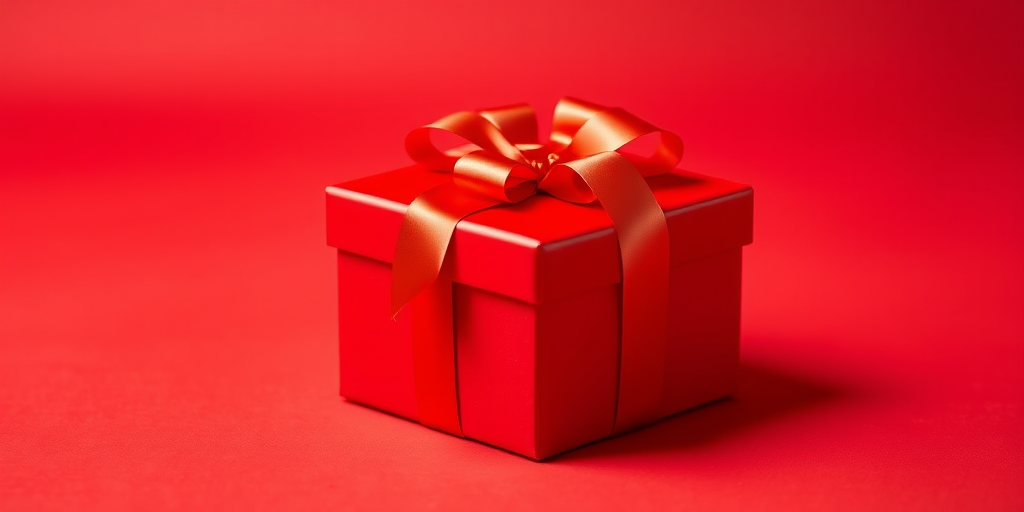 a vibrant red gift box with a glossy satin ribbon on a matching red backdrop, taken with a Canon EOS R5, 50mm f/1.8 lens, aperture set to f/2.8, shutter speed 1/200 sec, ISO 100, with soft diffused lighting for a smooth texture and depth.