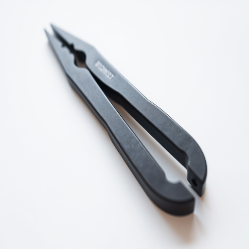 high-resolution image of a black metal tool resembling a pair of pliers on a white background, captured with a DSLR camera, 50mm lens, f/2.8 aperture, ISO 100, 1/125s shutter speed, natural lighting, shallow depth of field