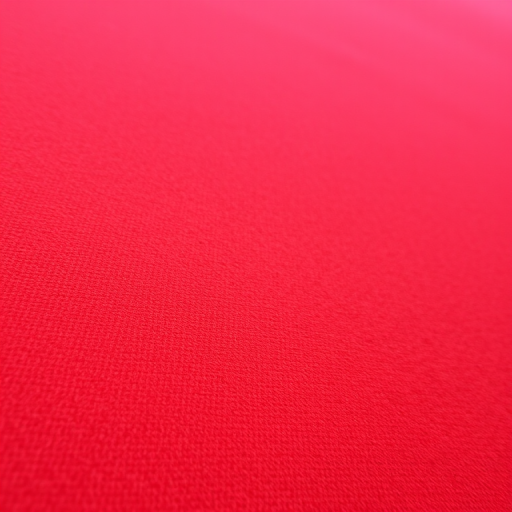 Wide shot of a textured red fabric, ISO 100, aperture f/8, shutter speed 1/60s, taken with a DSLR camera, natural lighting, macro lens to enhance fine details.