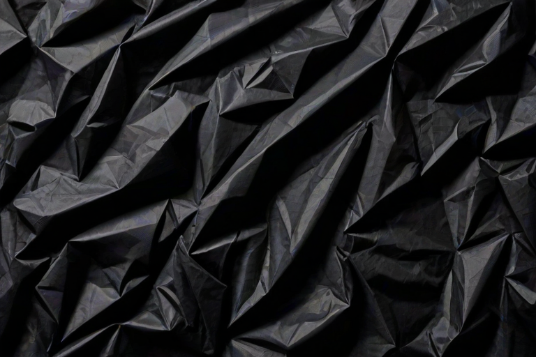 crumpled black paper