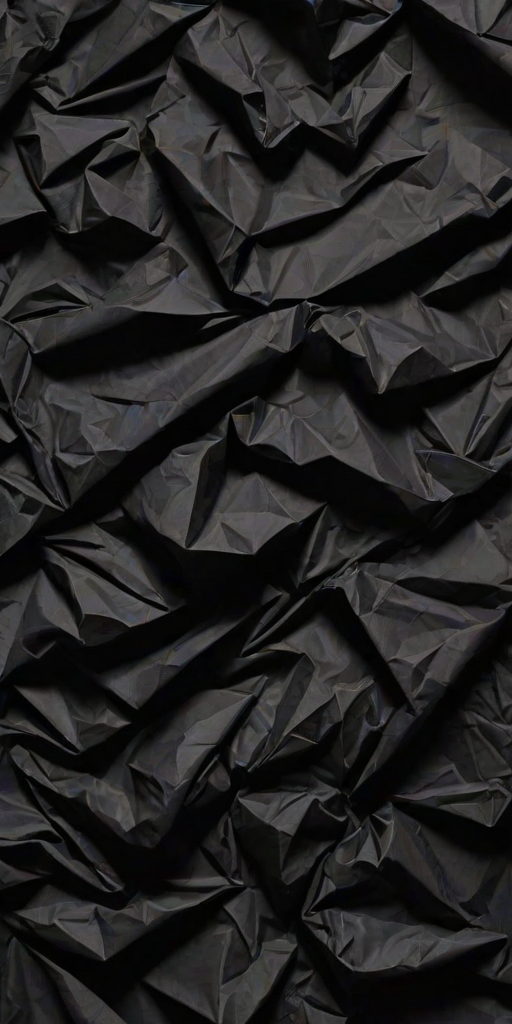 crumpled black paper