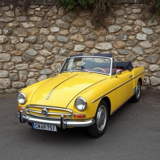 Regenerate the image of a vintage yellow convertible car parked in front of a stone wall, using a DSLR camera with a 50mm lens, f/2.8 aperture, ISO 200, taken from a low angle to emphasize the car's design and enhance color saturation.