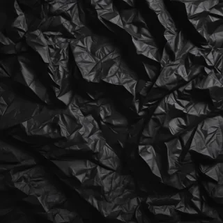 crumpled black paper