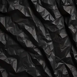 black crumpled paper