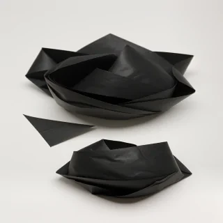 black crumpled paper