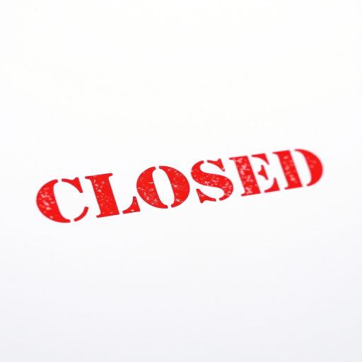 Generate an image of a bold red "CLOSED" stamp on a plain white background, with a DSLR camera using a 50mm lens, aperture set to f/1.8, ISO 100, and a shallow depth of field for enhanced clarity and focus.