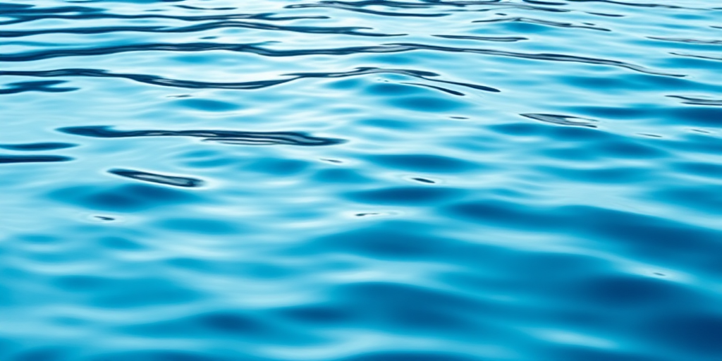 create an ultra-high resolution image of rippling water in shades of blue with smooth gradients, capturing intricate details of ripples and reflections, shot with a DSLR camera at f/8 aperture, ISO 100, 1/200s shutter speed, using a wide-angle lens at eye level to enhance depth and clarity.