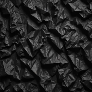crumpled black paper