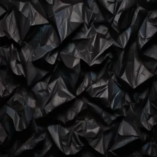 black crumpled paper