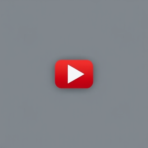 Generate a high-resolution image of a red play button icon on a gray background, using a DSLR camera, ISO 100, aperture f/2.8, focal length 50mm, shot from a straight-on view with soft lighting to enhance details and vibrancy.