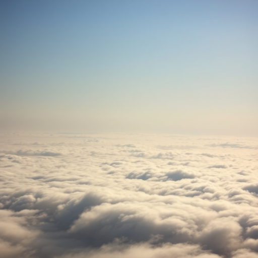 Create a serene landscape of soft, rolling clouds under a hazy sky, captured with a DSLR camera at f/8 aperture, ISO 100, 1/250 sec shutter speed, using a wide-angle lens from a high vantage point to enhance depth and clarity.