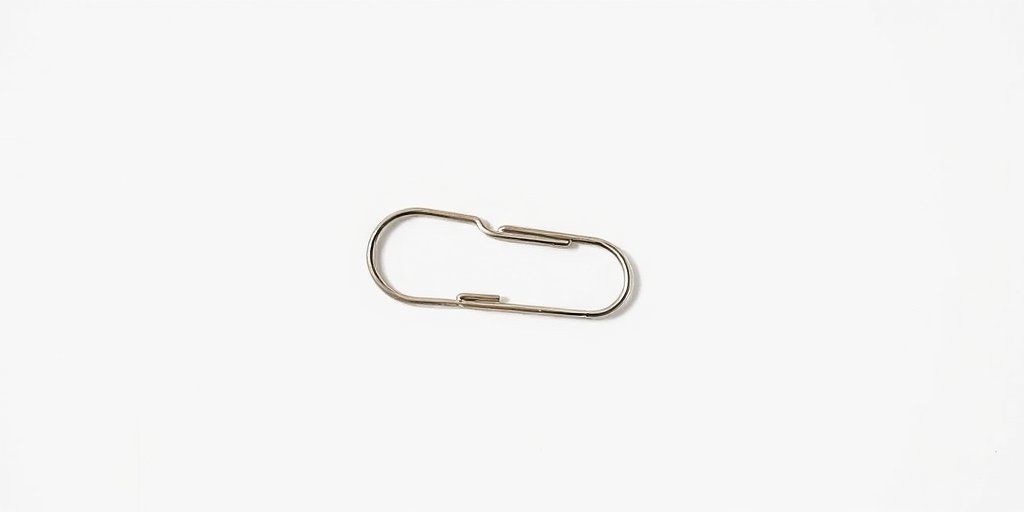 Create a high-resolution image of a paperclip on a white background using a DSLR camera, 50mm lens, aperture f/2.8, ISO 100, with soft natural lighting to enhance detail and clarity.