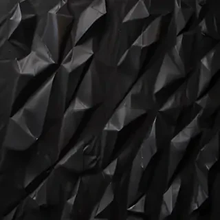 black crumpled paper