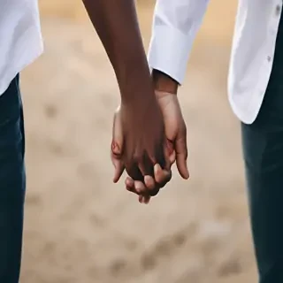 black couple holding hands