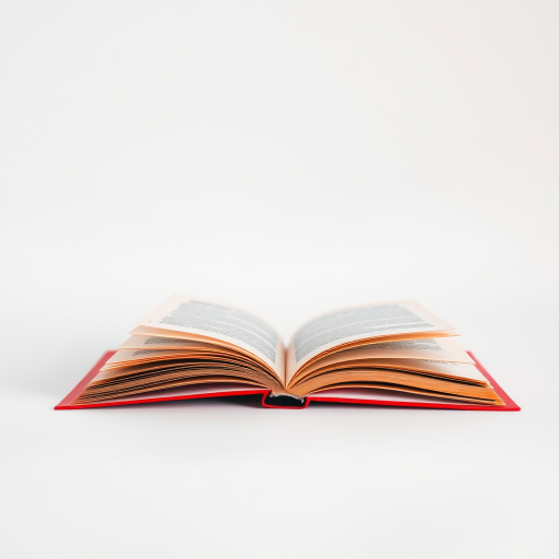 Create an image of a red open book against a plain white background, shot with a DSLR camera at f/2.8 aperture, 1/125s shutter speed, and ISO 100, using a macro lens for detailed texture and a soft focus effect.