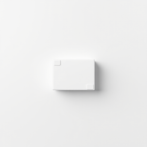 Generate a high-contrast black and white image of a simple geometric shape against a clean background, using a DSLR camera with a 50mm lens, aperture f/1.8, ISO 100, and a view from a 45-degree angle to enhance clarity and depth.