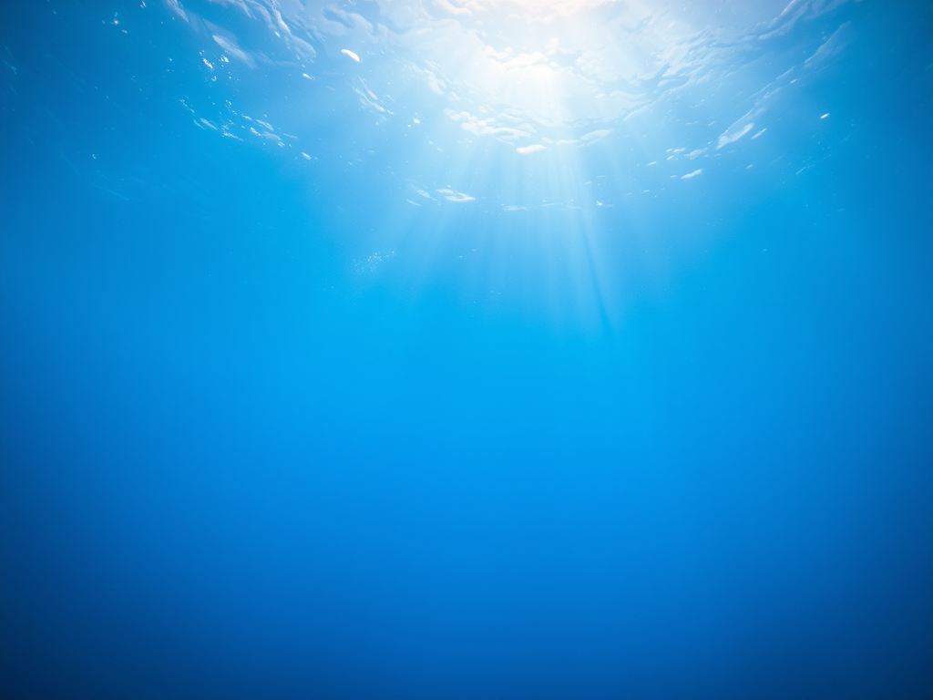Underwater scene with rays of light penetrating the surface, captured with a DSLR camera, 24mm lens, f/5.6 aperture, ISO 200, and 1/60 sec shutter speed, using a wide-angle view to enhance depth and clarity in the blue hues.