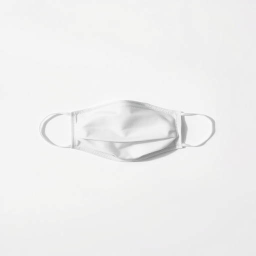 Generate a high-resolution image of a minimalist mask design on a plain background, shot with a Canon EOS R5 at f/2.8, ISO 100, 50mm lens, in portrait orientation, using natural lighting and a shallow depth of field.