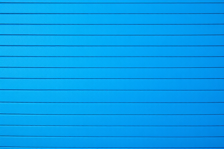 Create a high-resolution image of a blue horizontal wall with textured lines, using a DSLR camera with a 50mm lens, aperture f/8, shutter speed 1/125s, ISO 100, in natural light, top-down view to enhance depth and detail.