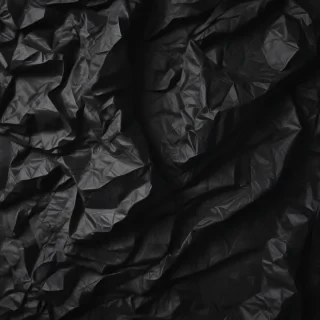 crumpled black paper