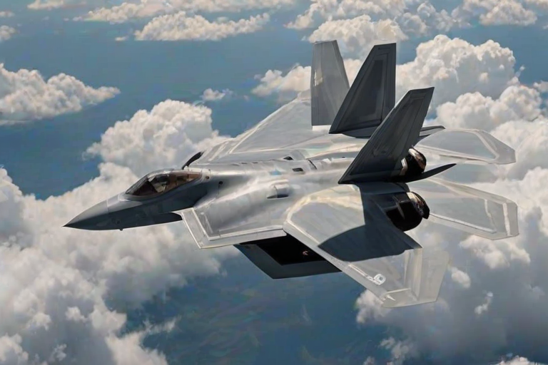 a high-resolution photograph of a military jet, specifically a F-22 Raptor, soaring through the sky. The aircraft is depicted in a sleek, metallic gray and beige color scheme, with visible markings and insignia on its fuselage. The jet's wings and tail are angled slightly, giving a sense of dynamic movement. The cockpit canopy is transparent, allowing a glimpse of the pilot's seat and instruments inside. The background is a vast expanse of fluffy white clouds, stretching across the sky with a subtle gradient of light and dark shades, indicating a clear, sunny day. The clouds are thick and textured, with visible wisps and tendrils that add depth to the image. The overall scene conveys a sense of speed and agility, with the jet slicing through the clouds with precision and power. The photograph's clarity and detail highlight the aircraft's sleek design and advanced technology, emphasizing its capabilities and readiness for action. The image is taken from a low angle, looking up at the jet, which adds to the sense of awe and admiration for the aircraft's performance.