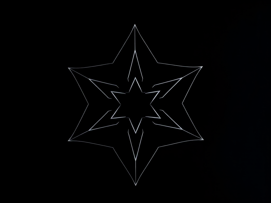 Create a high-resolution geometric star design on a solid black background, using a DSLR camera with a 50mm lens, aperture set to f/1.8, shutter speed at 1/100s, ISO 200, capturing from a top-down view with soft, diffused lighting.