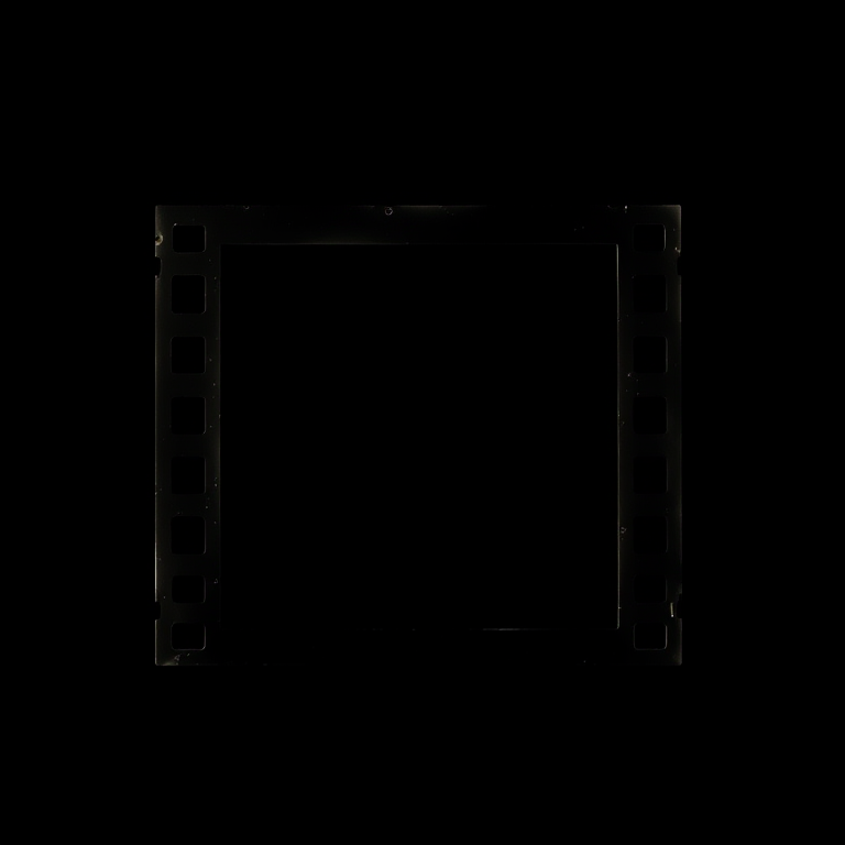Create a high-resolution image of a classic film frame on a black background with a 50mm lens, f/2.8 aperture, ISO 100, and a slight vignette effect, captured in a DSLR camera with a top-down view for dramatic emphasis.