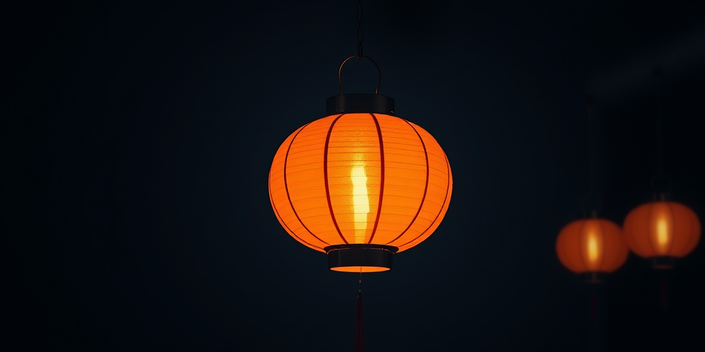Create a high-resolution image of a traditional orange lantern hanging against a dark background with soft, glowing light surrounding it, using a DSLR camera with an aperture of f/2.8, ISO 100, and a focal length of 50mm, in a studio setting with softbox lighting for enhanced clarity and depth.
