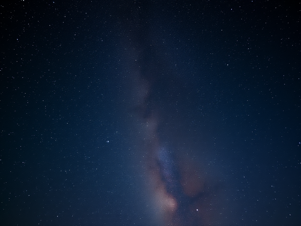 Astrophotography of the Milky Way galaxy in a clear night sky, using a DSLR camera with a 24mm lens, f/2.8 aperture, 20-second exposure, ISO 3200, taken from a high vantage point with minimal light pollution, captured in landscape orientation to emphasize the vastness of the cosmos.