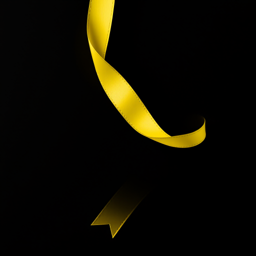 yellow ribbon on a solid black background, high dynamic range, 50mm lens, f/2.8 aperture, ISO 100, soft lighting, macro photography, digital camera