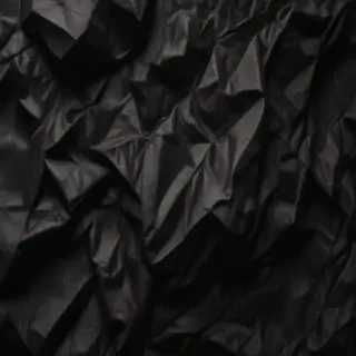 crumpled black paper