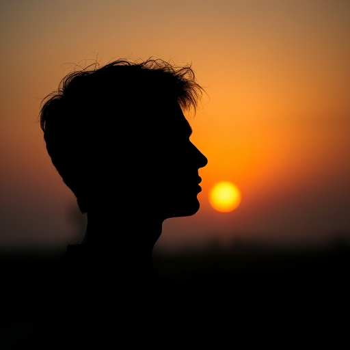 Capture a high-resolution image of a silhouette of a person with a sunset background, using a Canon EOS 5D Mark IV, 50mm lens, f/1.8 aperture, ISO 100, in a wide-angle view for enhanced depth and clarity.