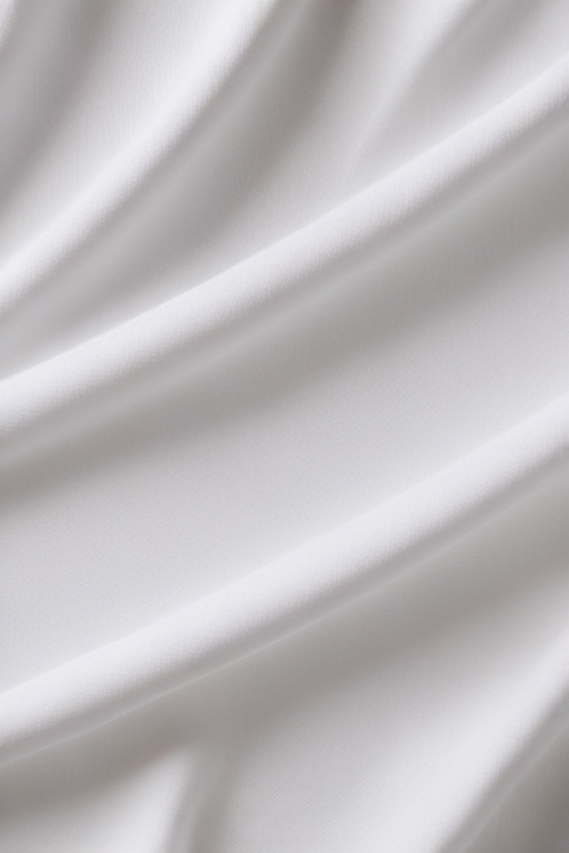 Soft and Elegant White Fabric Draped Gracefully with Gentle Waves and ...
