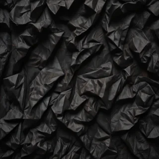 crumpled black paper