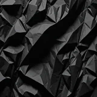 black crumpled paper
