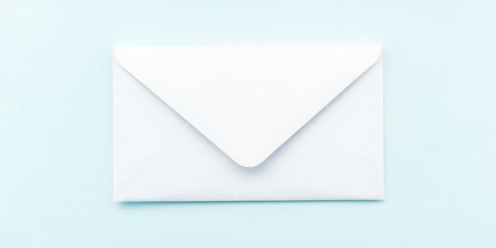 Create a clean, high-resolution image of an envelope with a light gradient background, top-down view, using a DSLR camera, 50mm lens, f/2.8 aperture, ISO 100, and natural lighting.