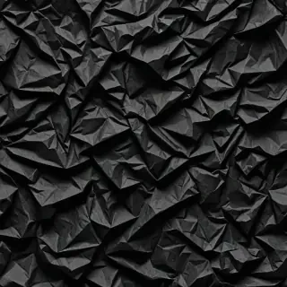 black crumpled paper