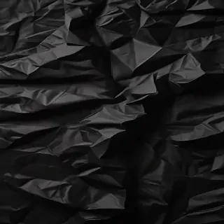 black crumpled paper