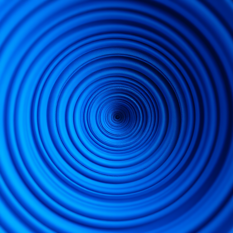 Create a high-resolution image of intricate blue circular patterns forming a spiral design with smooth gradients, shot with a Canon EOS R5, using a 50mm lens at f/1.8, ISO 100, and a shutter speed of 1/200s, with a macro perspective and vibrant color enhancement.
