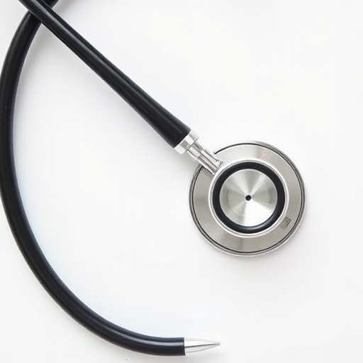 Create a high-resolution image of a stethoscope with a smooth design, using a DSLR camera at f/2.8 aperture, ISO 100, 50mm lens, natural light, top-down view, with a clean white background to enhance contrast and visibility.
