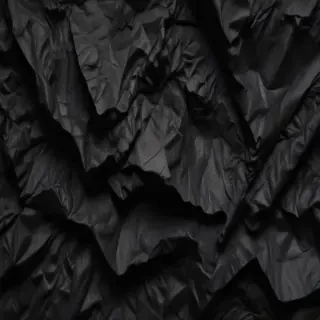 crinkled black paper