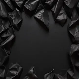 black crumpled paper