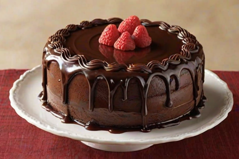 Create an image of a rich chocolate cake with a smooth chocolate frosting. The cake should have a glossy chocolate ganache dripping down the sides. Top the cake with swirls of chocolate frosting and fresh raspberries, along with chocolate sprinkles for decoration. The background should be simple and rustic to highlight the cake.