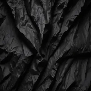 crinkled black paper