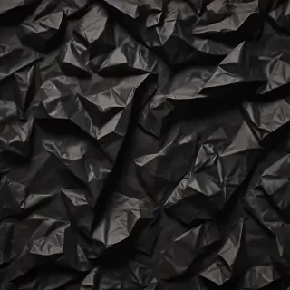 black crumpled paper