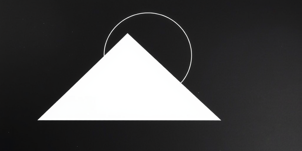 Create a high-contrast minimalist abstract design featuring a large white triangle at the bottom and a semicircular shape above, centered against a black background, shot with a DSLR camera at f/8, ISO 100, 1/125s, using a 50mm lens and a top-down view for enhanced clarity and sharpness.