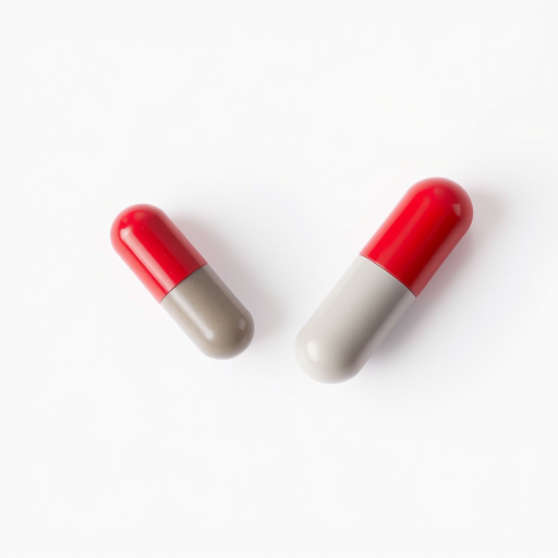 Create an image of two capsules, one red and one gray, placed side by side on a white background, shot with a DSLR camera at f/8, ISO 100, 50mm lens, top-down view, soft lighting for enhanced clarity and detail.