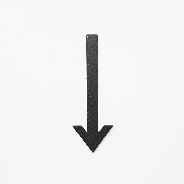 Create a high-resolution image of a dark gray downward arrow on a white background, using a DSLR camera, 50mm lens, aperture f/2.8, ISO 100, and a slight overhead angle to enhance details and contrast.